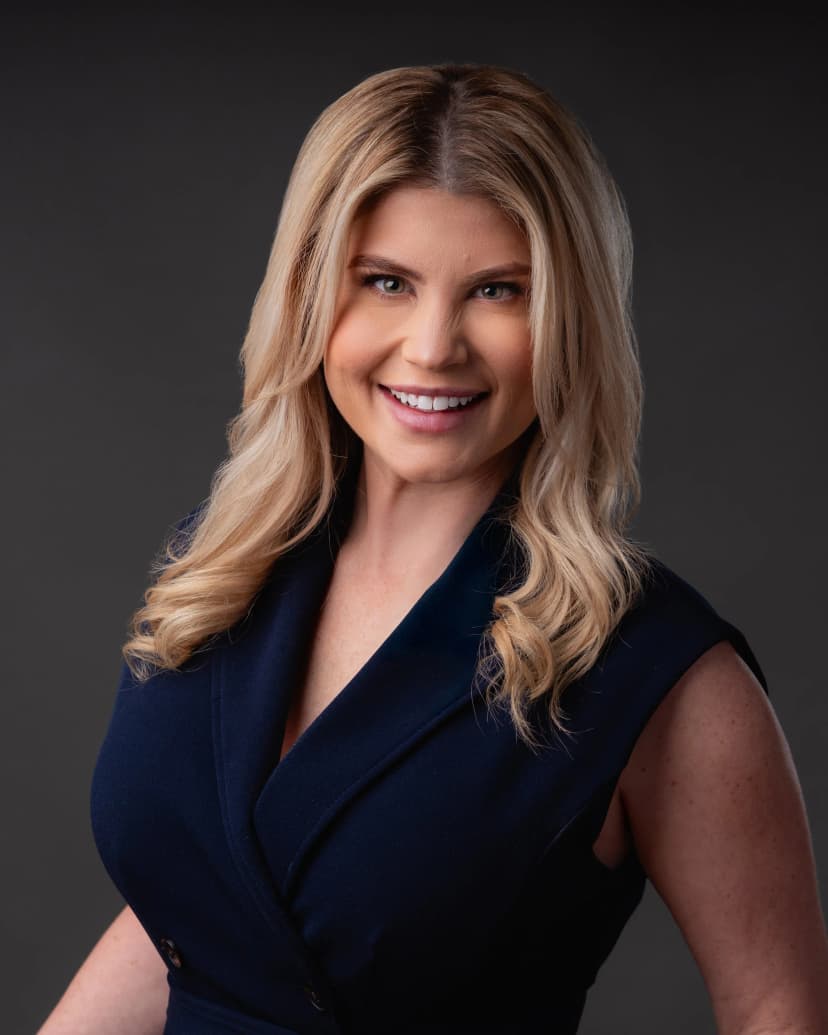 Professional headshot photography showing a confident, approachable business professional