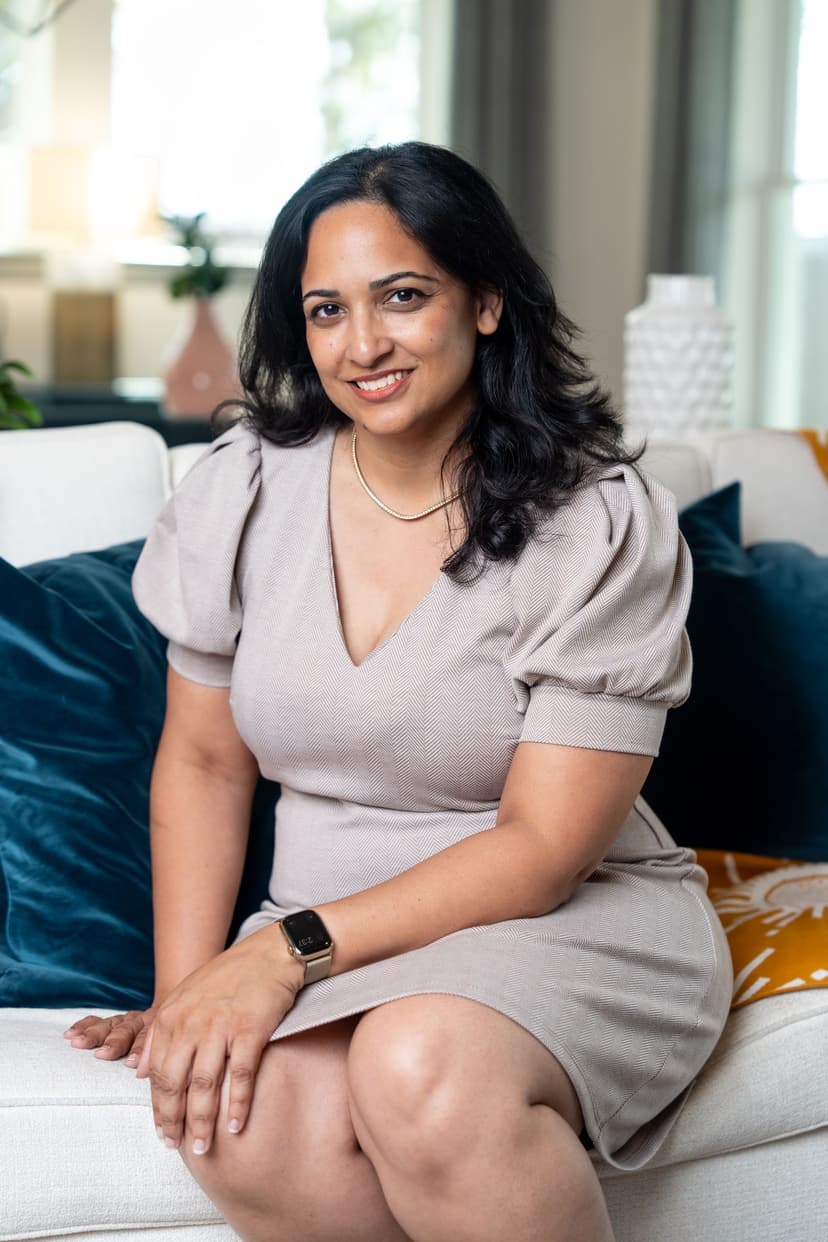 Professional woman in business setting for real estate agent branding