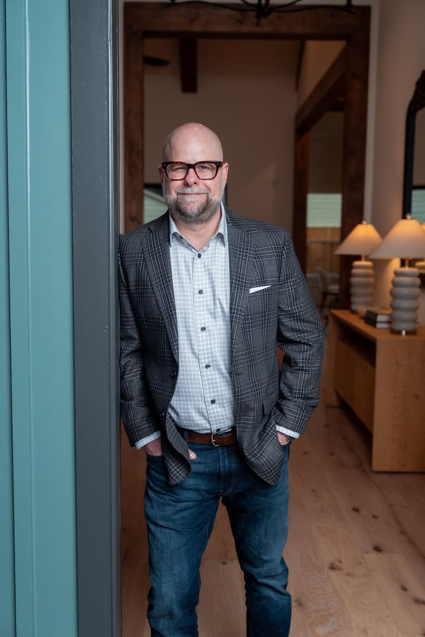 Professional man in home setting for real estate branding photography